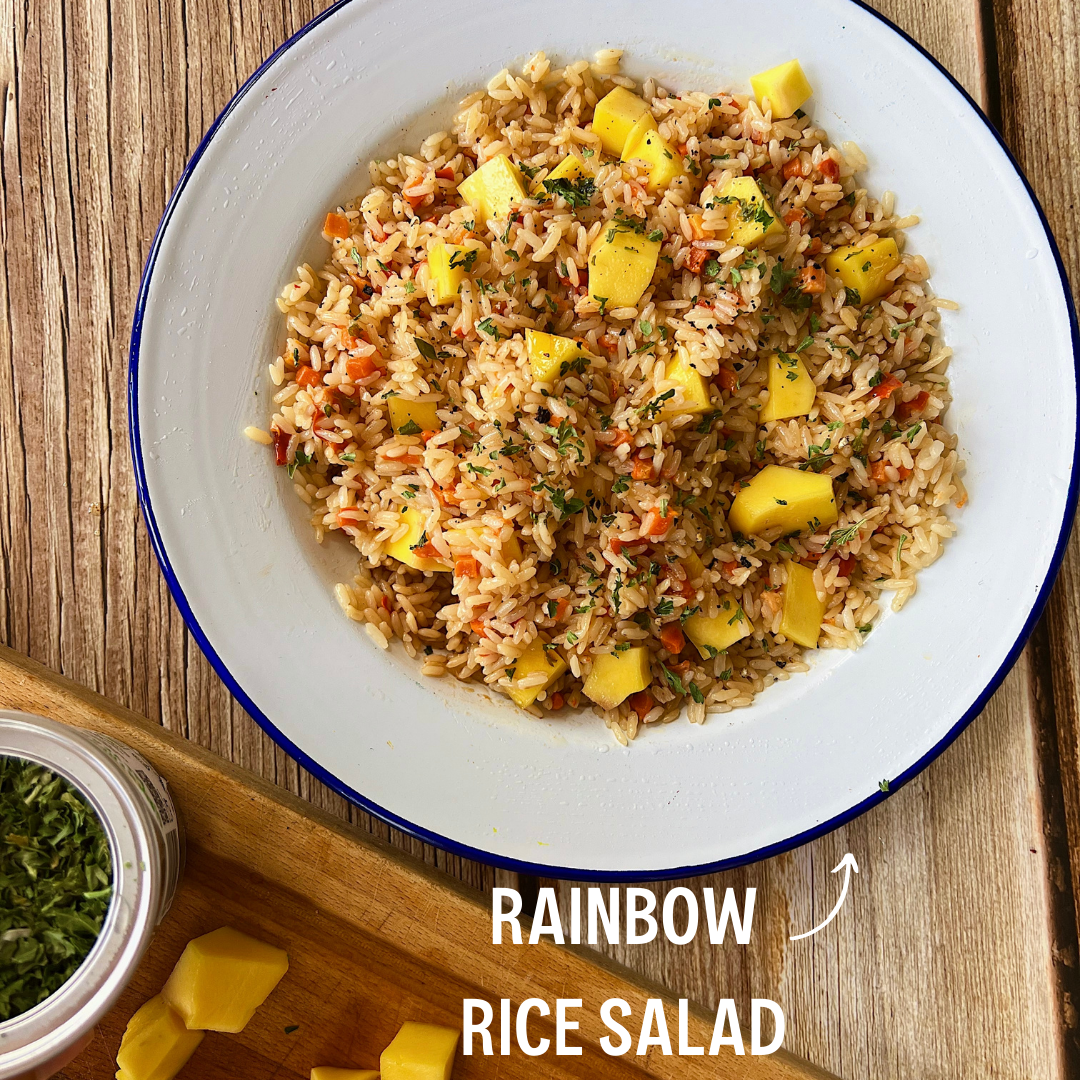 Colourful Rice Salad on a plate with freeze-dried red onion