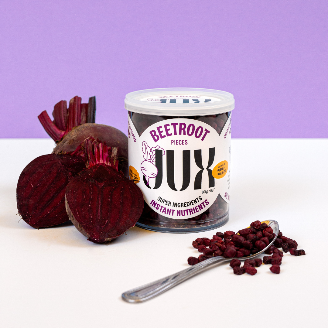 JUX Freeze-dried chopped Beetroot pieces in jar and on spoon next to fresh beetroot