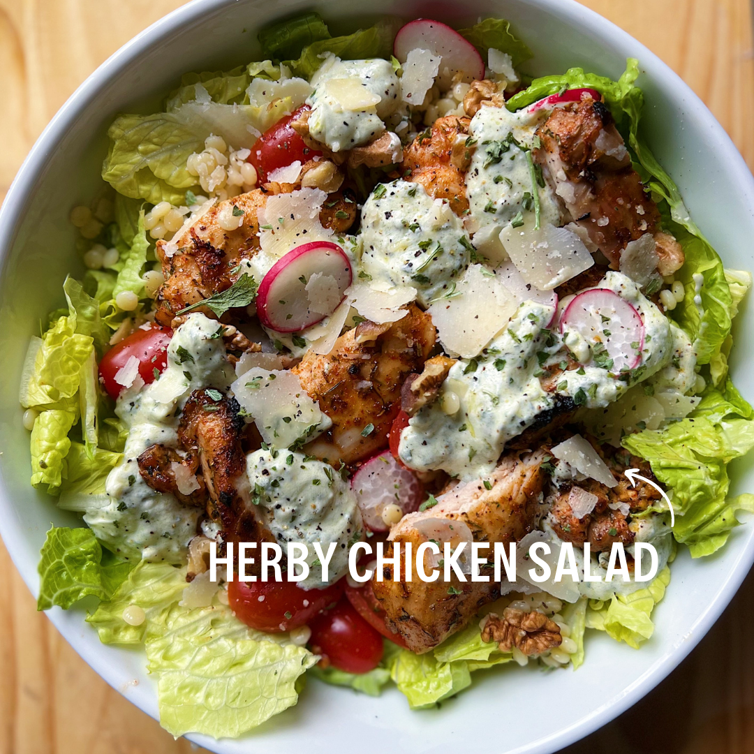 Herby chicken salad recipe topped with JUX freeze-dried Rosemary leaves