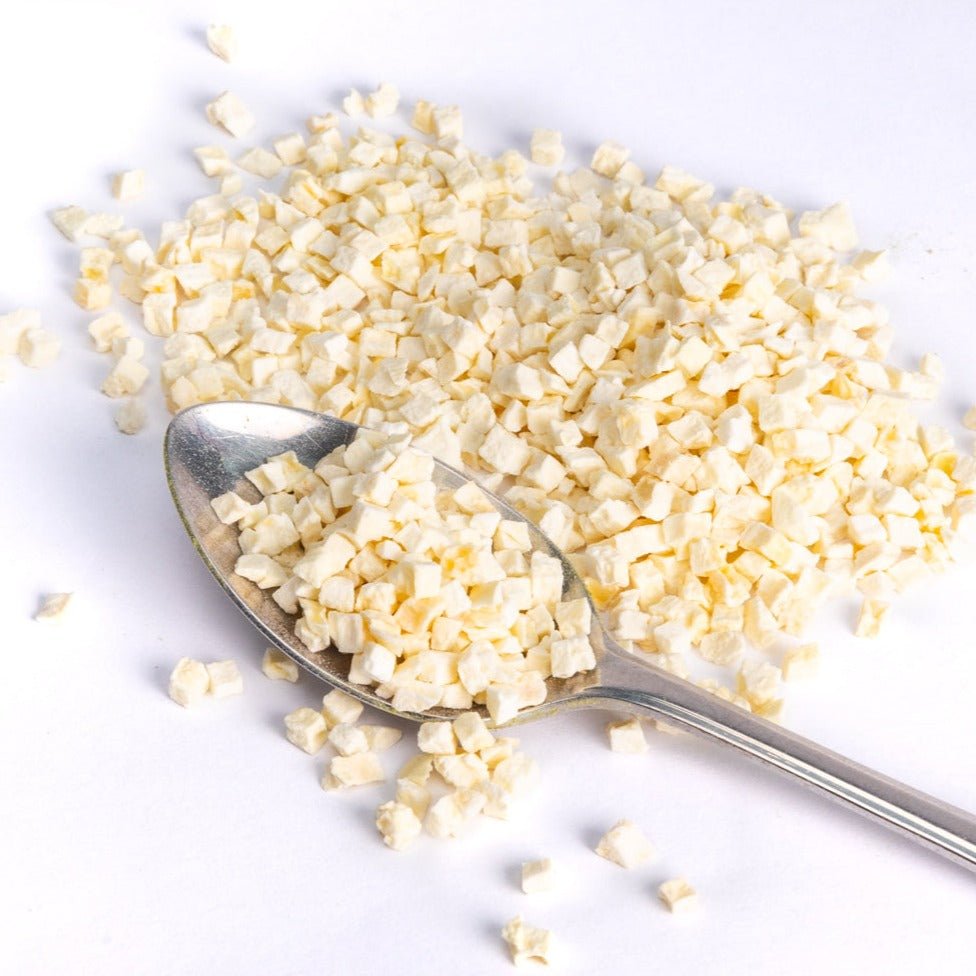 JUX food freeze-dried chopped garlic pieces on a teaspoon