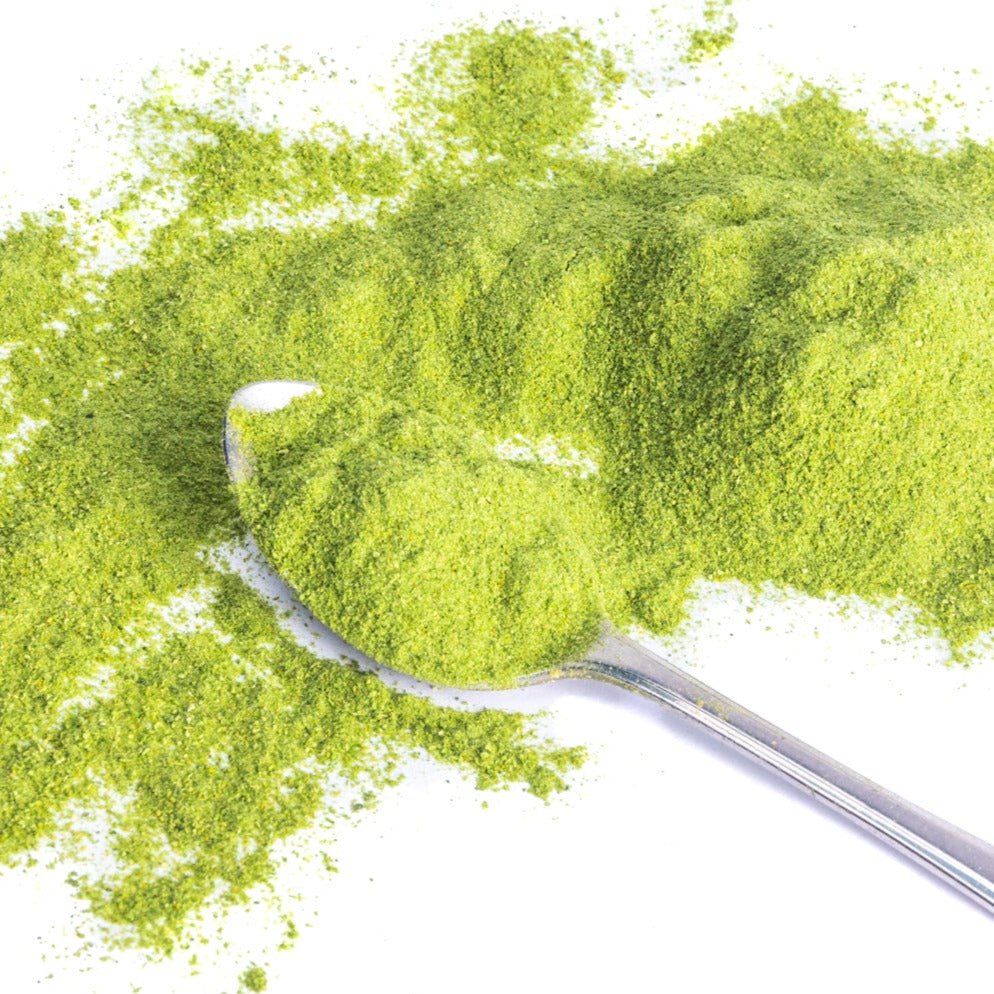 JUX freeze-dried Broccoli powder on a teaspoon